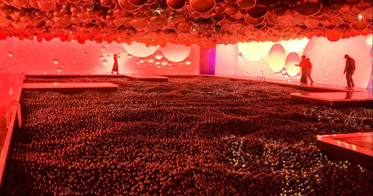 Vibrant balloon-filled room at The Balloon Museum exhibit, perfect for a romantic date night.