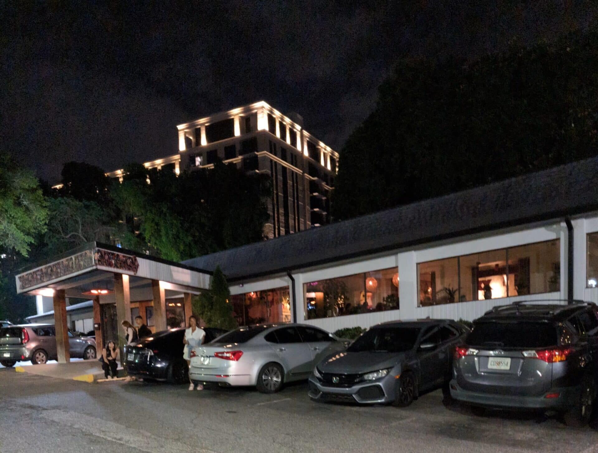 Exterior view of Chido and Padre's restaurant in Buckhead at night.