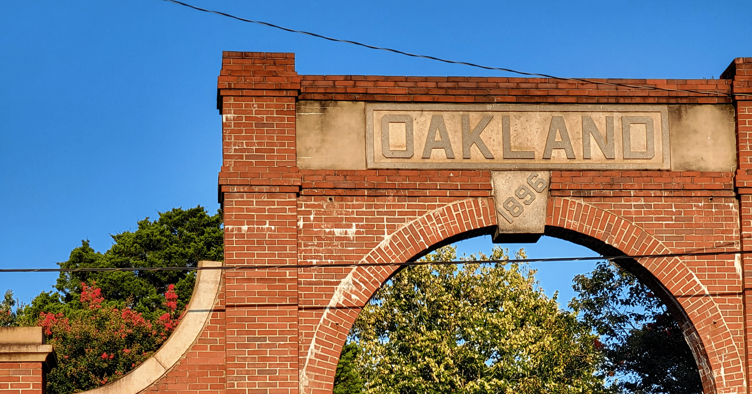 Historic entrance sign of Oakland Cemetery, built in 1896.