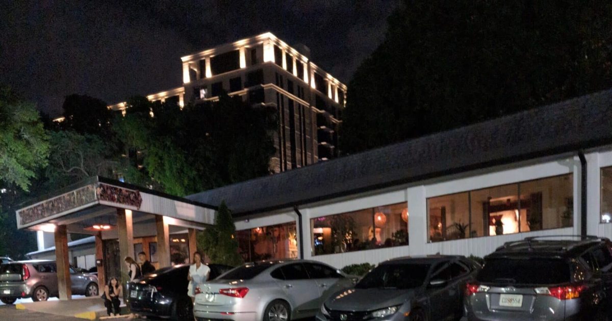 Exterior view of Chido and Padre's restaurant in Buckhead at night.