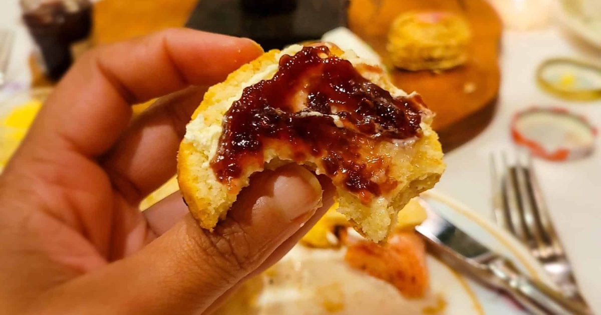 A close-up of a scone with clotted cream and strawberry jam at Afternoon Spring Tea, Ritz Carlton Atlanta.