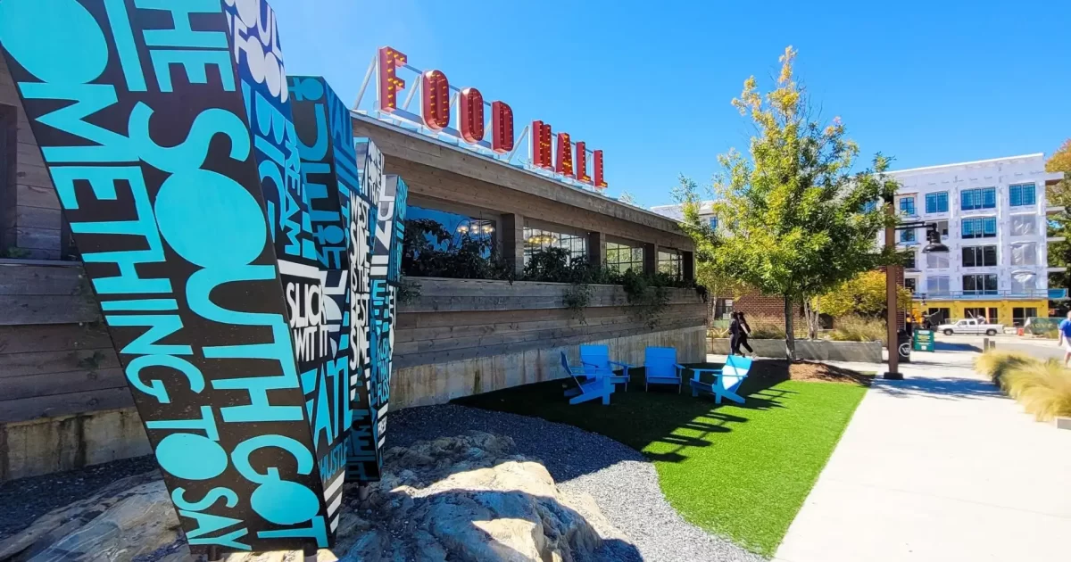 Exterior of Chattahoochee Food Works with artistic signage.