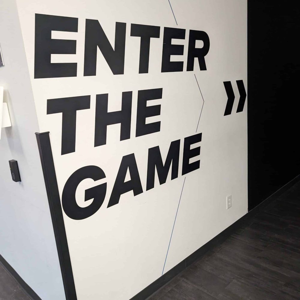 Enter The Game sign at Activate Atlanta"