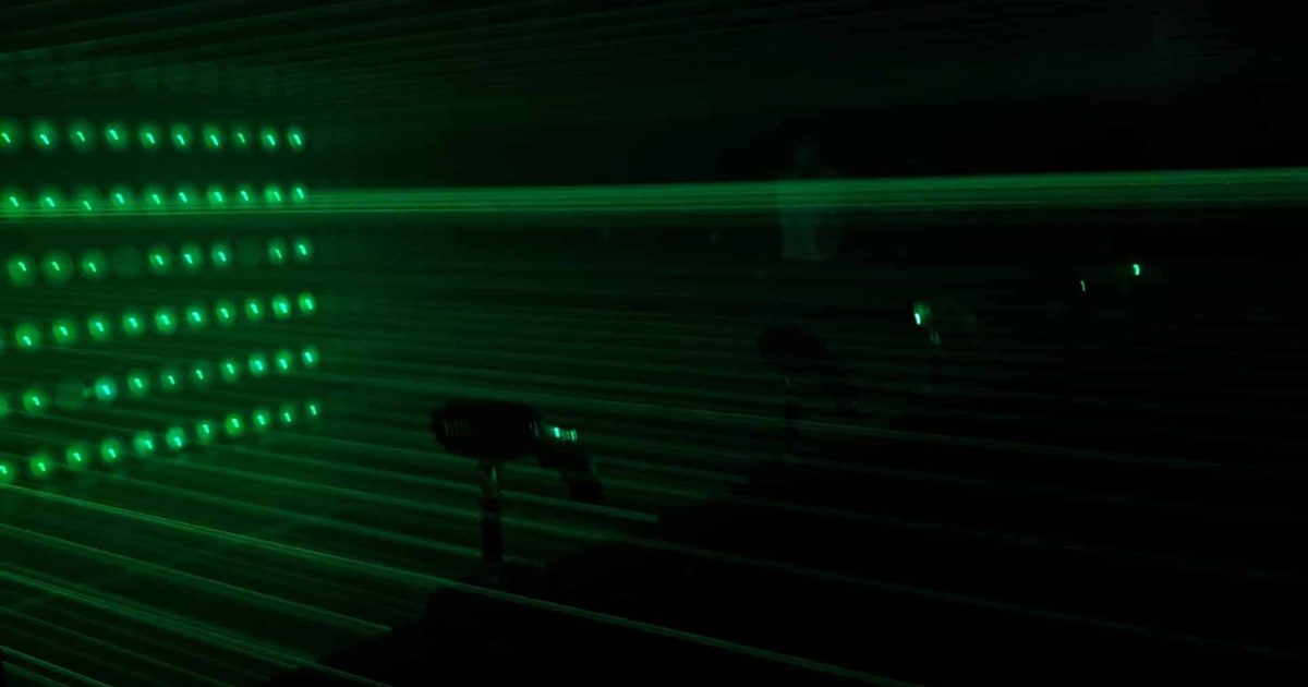 Laser beams in a dark game room at Activate Atlanta