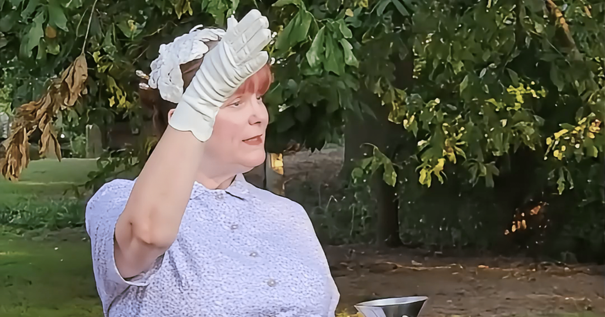 Woman dressed in period clothing acting during Love Stories of Oakland Cemetery tour.